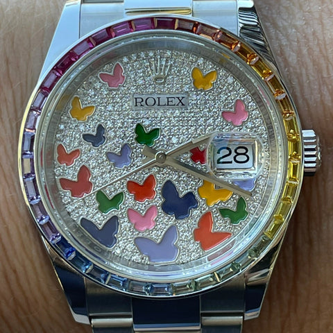 Rolex 36mm Datejust 126200 Women's Watch.  Custom Pave Diamond and Butterfly Dial.  18k White Gold and Tapered Baguette Rainbow Bezel