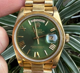 Rolex 36mm Presidential Day-Date 18078.  Watch has the bark finish from Rolex.  Refinished Olive Green Dial with Raised Roman Markers Mint