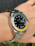Rolex men’s stainless steel 40mm GMT Master II116710.  Custom yellow and green “Sprite”